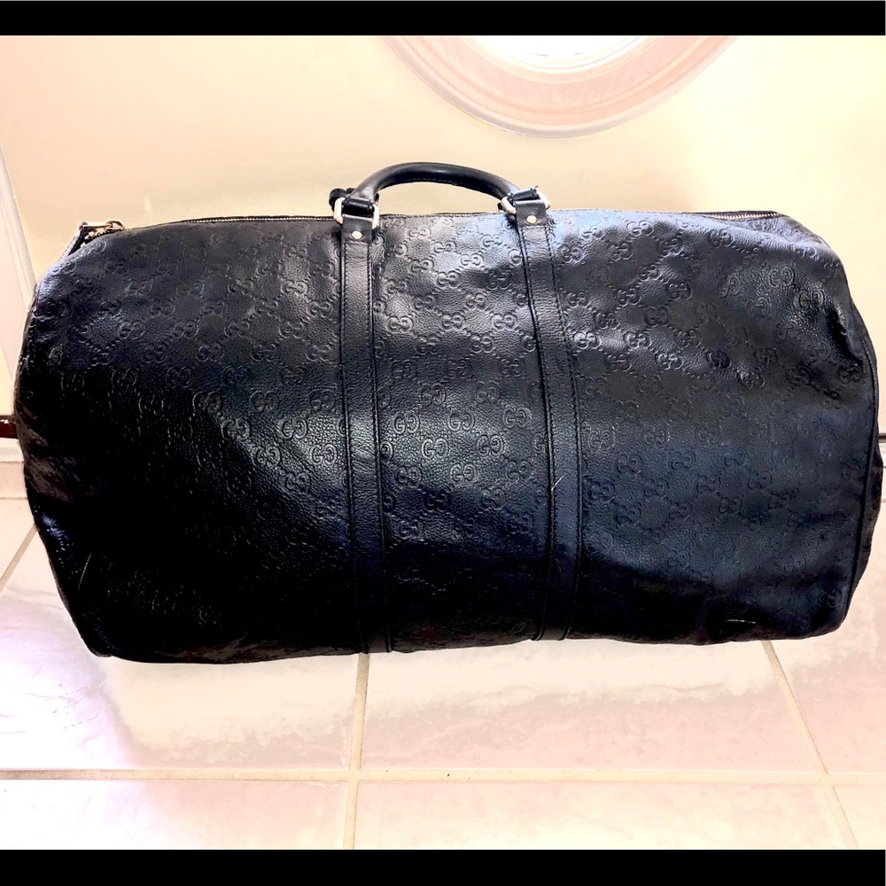 Men’s Gucci soft leather black duffle carry on bag